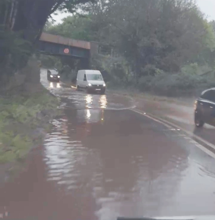 Flooding after heavy rain closes part of A358 in Combe Florey